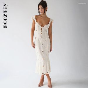 Fritidsklänningar BoozRey Jacquard ihålig ärmlös klänning 2022 sommar blommig kjol Söt och söt hög midja Maxi för kvinnor