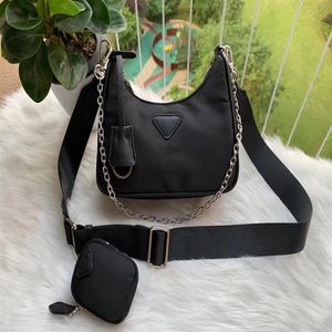 2022 NYLON Woman Luxurys Men Mens Pags Lady Womens Mens Crossbody Tote Hobo Houtter Courses Handbags Wallet Backpak308i