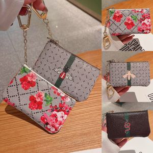 Luxury Card Holders Womens Män Kvinnor Key Walls Designer Fashion Coin Purse Card Holder Läder Dragkedja Bag Accessoires M62650