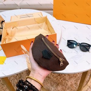 Designer Brown Mini Wallet Womens Girls Coin Purse Organizer Pocket Söt liten väska bokstavstryck handledsäckar män zip handväskor plånbok291n