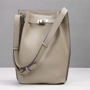 The new first layer leather bag leisure shoulder vertical bucket original leather horseshoe handbag women's single shoulder b309R