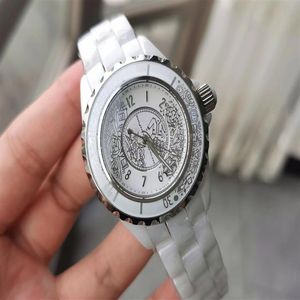 Yeni Marka Kadın Erkekler Çift Seramik Saat Totem Tasarım Dial 12 Serisi Ünlü Marka Logo Saati Lady Watches 33mm 38mm333i