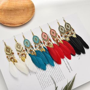 Kolczyki Dangle Bohemian Biżuter owalny kwiat szkliwa urok kolczyki vintage pióro Pendientes Mujer Pereads liść brzęczenie Ucha Prezent