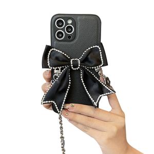 Case di cellulare Diamond Black Diamond Case di cornice cross-body Rhinestone per Apple 13 iPhone12 11 14 Copertina posteriore Cinta di copertina PU Copertina di marea Premium Tide Brand