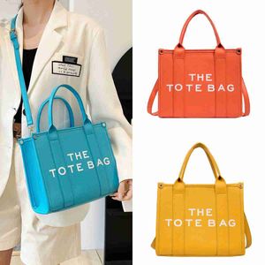 Designer Canvas The Traveler Tote Bag Damen Handtaschen Süße Träume Geldbörsen PU Leder Mode Schultertaschen Geldbörse oben