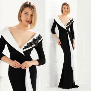 Schwarz-weiße Meerjungfrauenkleider mit langen Ärmeln, perlenbesetztem Fleck und sexy Trompetenkleid für die Brautmutter