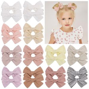 2 st/set fast färg bowknot hårklipp hårtillbehör söta baby flickor bomull bågar hårnålar Barrettes barn huvudbonader