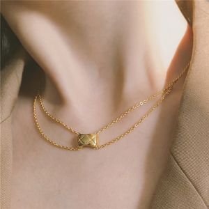 Mode smycken 18k gulddesigner halsband sydamerikansk rombinhänge choker halsband 316l titanium stål dubbel kedja för kvinnlig fest kort chokers gåva