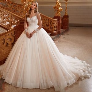 Lyxpärlor bollklänning bröllopsklänning för brudtransparent långärmad vestidos de mariage tyll prinsessan brudklänningar