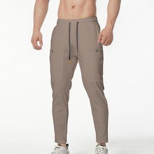 Männer Hosen Männlich Frühling Casual Fitness Laufhose Kordelzug Lose Taille Farbe Passenden Tasche Jogginghose