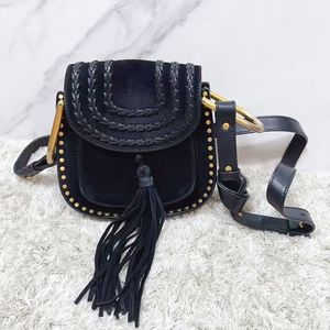 Vintage klasik püskül saddles lüks tasarımcı çanta omuz tote odunsu retro moda kadın çanta çanta erkek çapraz debriyaj flap gerçek deri astar çantaları