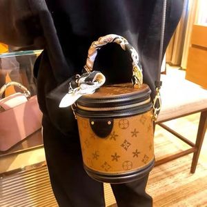 En Lüks kalite Omuz Çantası Tasarım Çantaları Satışı Indirim hakiki deri Çanta Çanta Kadın Cannes Moda Namlu Şekilli Çiçek Bayan Çanta Crossbody