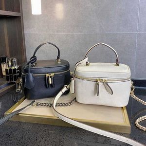 Läder av hög kvalitet kvinnors kosmetika handväska lyxdesigner väska lyxväska lady handväska mini lunchlåda väska resa liten låda topp