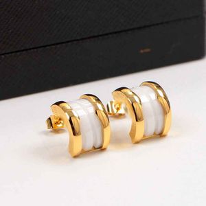 10 years factory wholesale new fashion titanium steel wide arc black and white ceramic earrings couple gift come with dust bag