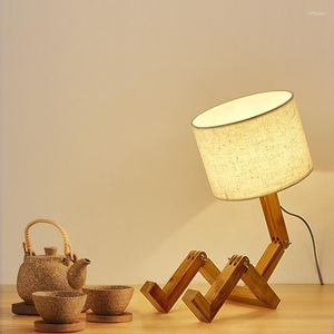 Lâmpadas de mesa Leitura em forma de humano quarto de lâmpada de decoração quente arte de madeira LED Proteção para os olhos Tripé Luz de madeira sólida criativa