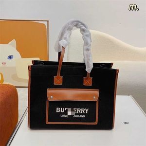 Burbrerys Designer Burbrerys Women Handbags Korean version Den senaste populära dukens shoppingväska storlek 40.15.29