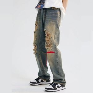 Jeans masculinos de cintura alta rasgados para homens homens calças jeans de comprimento completo com painéis de tassel vintage streetwear 2022 Corte de verão
