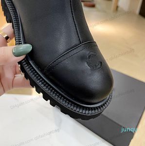 Kadın ayak bileği botları düşük topuklu düz ayakkabılar inek derisi patik ünlü tasarımcı siyah platform şövalye batı moda kar patik retro rahat açık ayakkabı