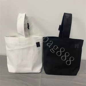 女の子のキャンバスレタープリントシングルバッグのための高級デザイナーショッピングバッグ黒と白の色低価格