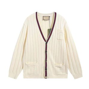 Jesień/zima damski kardigan sweter z dekoltem w serek jednorzędowy z długim rękawem luźny 2022 damski luksusowa marka moda biały dopasowany top