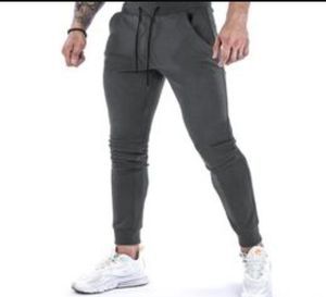 Calça masculina letra de designer impressão de trajes casuais de trajes pretos calças de moda de moda de moda de hip hop