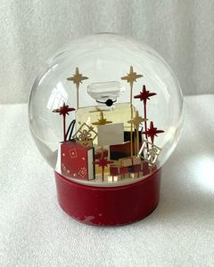 2024 Edition C Classics Red Christmas Snow Globe with Perfume Bottle Inside Crystal Ball for Special Birthday Novelty VIP Gift Popular Sell like hot cakes designer