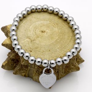 Braccialetti con ciondoli Gioielli Bracciale in oro Bracciale in acciaio inossidabile 316L di lusso con perline a forma di cuore Bracciale da donna con perline alla moda rotonde firmate da donna