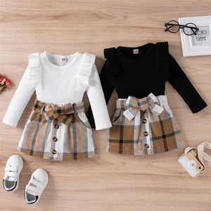 衣料品セット幼児の子供の女の子2ピース衣装長袖ニットリブ付きソリッドカラートップボウノットボタン格子縞のミニスカートセット9m-4t221110