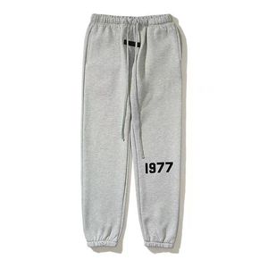 Calça Masculina Joggs Moletom Clássico Lett Flocking 1977 Cordão Solto Ovsize High Street Joggs Hip Hop Autumn Trouss A10