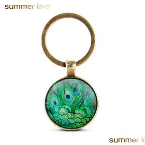 Key Rings New Design Crystal Keychain Unique Art Peacock Wiggling Feather Key Holder Handmade Animal Pattern Keyring For Women Girls Dh8Ae