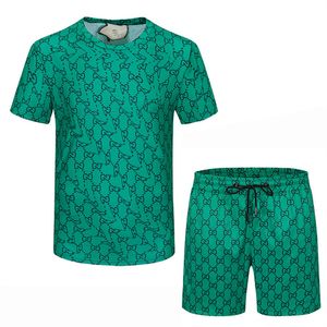 2022 Mens Beach Designer Tute Abiti estivi Moda Donna T-shirt Camicie da vacanza al mare Pantaloncini Set da uomo Luxury Casual Abiti sportivi Abbigliamento sportivo A33