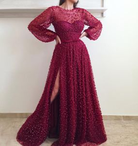 2018 Luxury Evening Dresses Dubai Pärledspets med puffiga långa ärmar Sidospla Bling Rhinestones Pearls Bow Belt Plus Size Prom