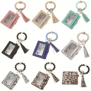 Fashion Pu Leather Armband Wallet KeyChain Party Favor Tassels Bangle Key Ring Holder Card Bag Silicone P￤rled Wristlet Keychains Handv￤ska Kvinnor smycken SS1117