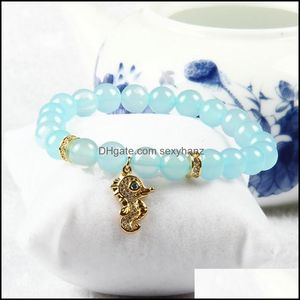 Braccialetti con ciondoli Gioielli oceanici all'ingrosso Clear Cz Spacer Fascino cavalluccio marino con 8 mm di agata blu naturale Perline di pietra Bracciale con perline Drop Dhnol