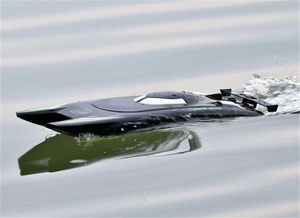 Electric RC Boats 2 4Ghz RC Racing Boat High Speed Yacht 30 KM H Remote Control Speedboat Rowing Ship Model USB Charging Water Gam