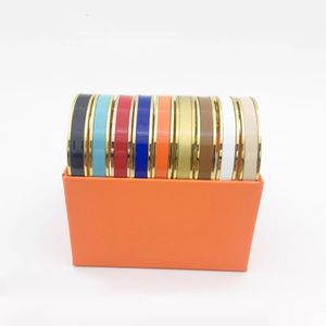 Com caixa de alta qualidade 8MM design de design pulseira de aço titânio fivela de ouro pulseira de fivela de moda joias masculinas e femininas pulseiras