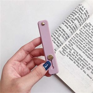 1 pc alças de telefone celular encantos 1 pçs cor doce caso do telefone móvel suporte pulseira suporte push stretch silicone faixa de pulso mão dedo aperto soquete titular