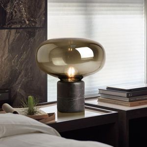 Lâmpadas de mesa Pós-moderna Lâmpada LED preta Luzes de vidro transparente moderno Lustres do quarto Base de marmore de mármore Estudo da sala de estar