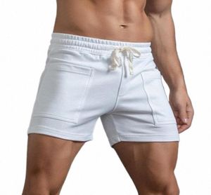 Men039s pantalones cortos blancos jeans cortos para hombres para hombres color sólido color sólido pantalones pantalones de bolsillo de bolsillo para deportes casuales sueltos 3625464