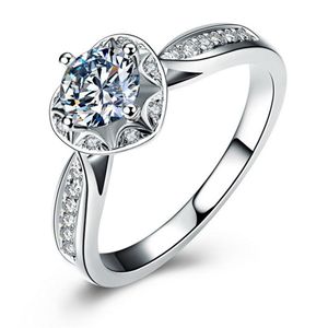Luxury 100% 925 Ring de boda de plata esterlina con un solo diamante SONA en forma de coraz￳n que se muestra en un s￭mbolo cl￡sico de Love300N