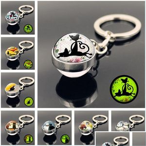 Nyckelringar Cartoon Cat Glass Ball Keychain Glow in the Dark Pendants Key Holder Bag hänger Fashion Jewelry Drop Delivery DHBM9