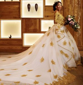 Sparkly Gold Princess a-line Wedding Dresses 2023 Luxury Lace Applique Beaded African Middle East Church Long Sleeve bridal gown