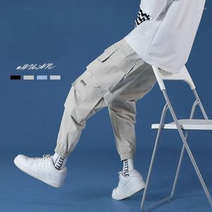 Pantaloni da uomo Pantaloni da jogging da uomo Streetwear Pantaloni da uomo Cargo Tasche Pantaloni da jogging Hip Hop Moda uomo nero Harem 5XL