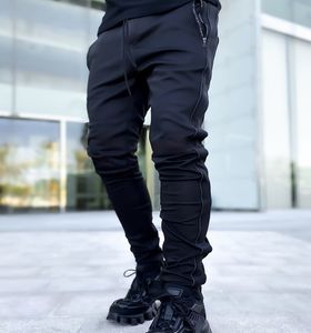 Tute da uomo Primavera e autunno abbigliamento da lavoro da uomo pantaloni sportivi da uomo per il tempo libero marca multitasche da jogging notturno pantaloni fitness riflettenti Jogg 221122