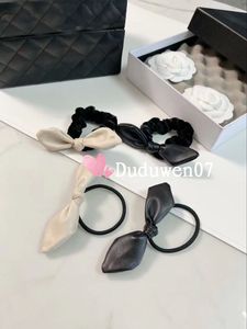 Party Favor Fashion Bowknot Metal C Symbol Classic Elastic Hair Ties Pu Leather Hairrope Hairband Gift Vipcards