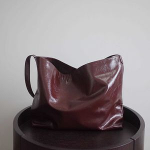 HBP Totes Storage Bags Le Orange New Korean Small Popular Design Crossbody Bag Casual Shoulder Bag Oil Wax Leather Simple Leather Cowhide Bucket Bag 221116