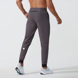 LL męskie długie spodnie do biegania sportowy strój do jogi szybkoschnący ściągany sznurkiem siłownia kieszenie spodnie dresowe męskie dorywczo elastyczny pas fitness