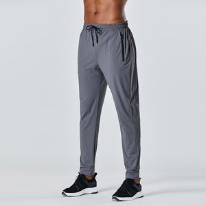 Lu vendita calda nuovi pantaloni della tuta pantaloni da corsa pantaloni larghi da uomo pantaloni elasticizzati casual sottili traspiranti