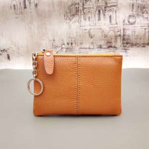 DHL50PCS Monety torebki europejskie kobiety oryginalne skórzane kwadratowe kwadratowe krótkie portfel