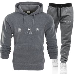 Tute dello stilista Autunno/inverno Set sportivo Modello di lettera Calda felpa con cappuccio Pantaloni stampati Felpa casual Camicia da jogging Giacca con cerniera